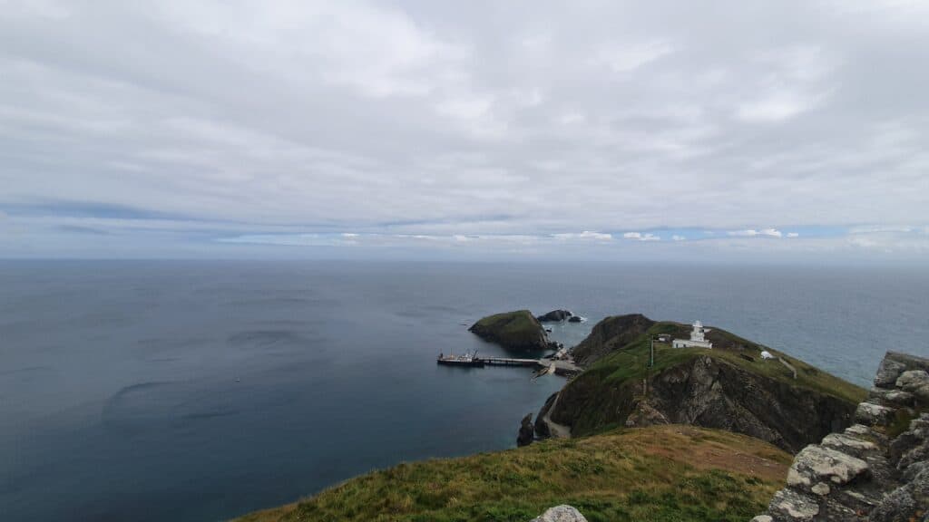 landscape of island with grass and water