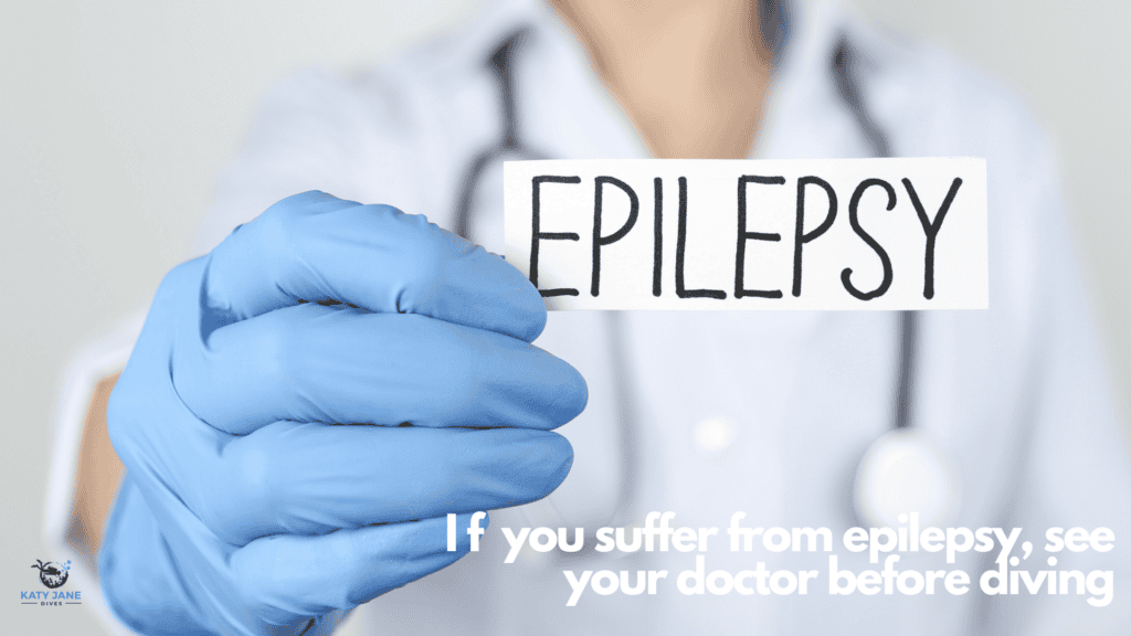 doctor in white with blue glove holding up a piece of paper with epilepsy written on it